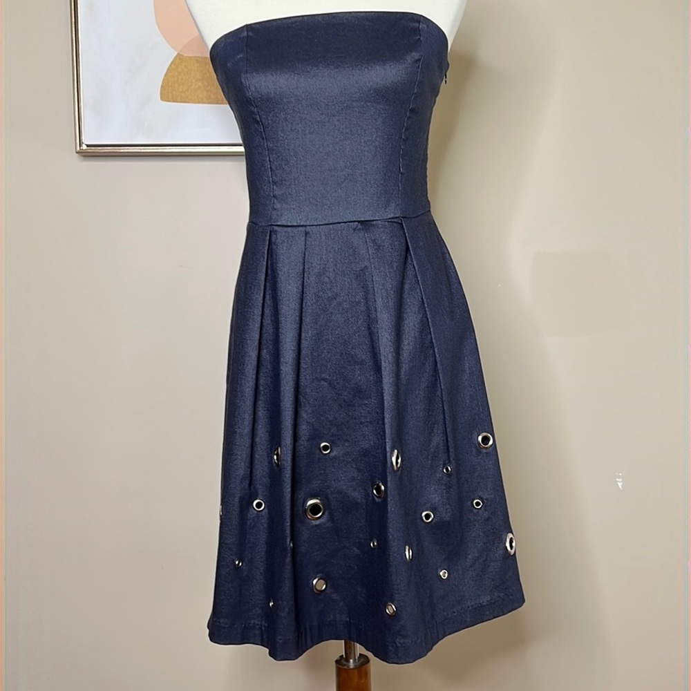 Eva Franco stretch denim strapless skater dress with grommet details